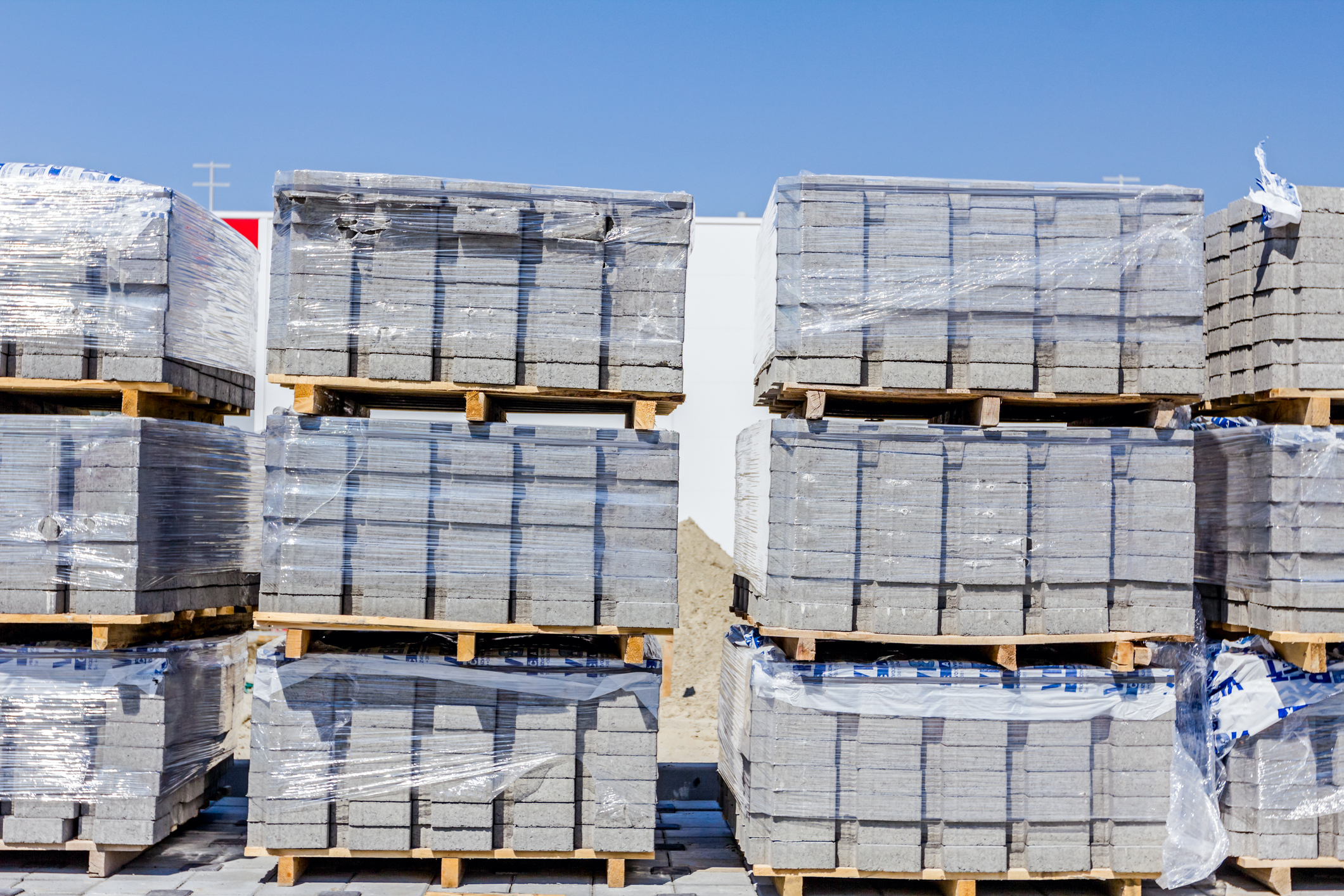 stack of paving slabs piled on wooden pallets
